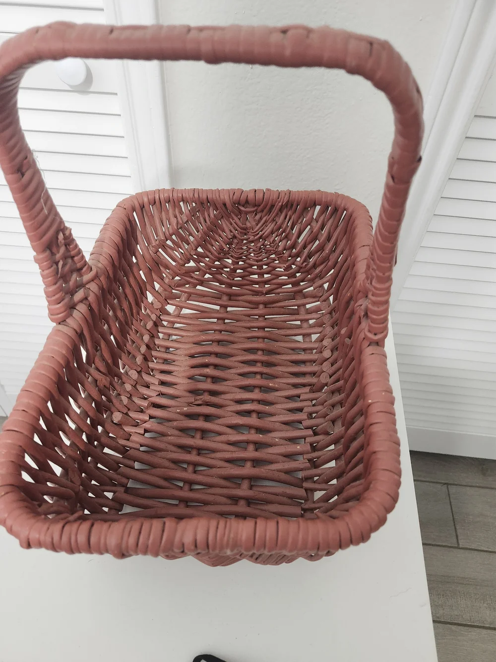 Handwoven Rust-Colored Decorative Storage Basket with Handle